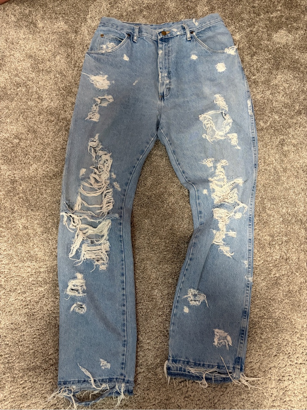 Distressed Light Blue Men’s Ripped Jeans